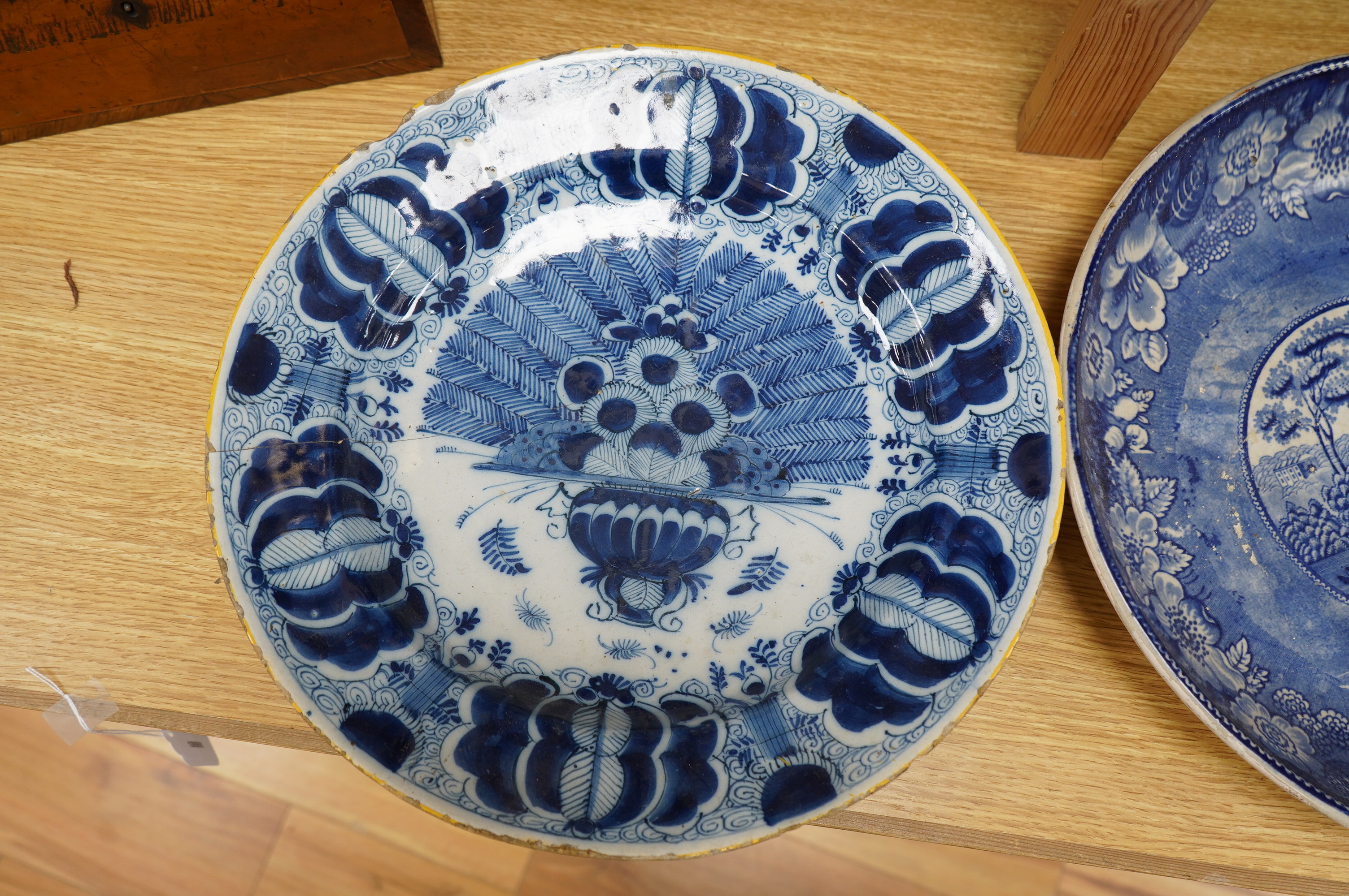 A 18th century delftware charger, another later, a Victorian Briar Rose earthenware dish and a Chinese dish, largest 35cm Condition - poor